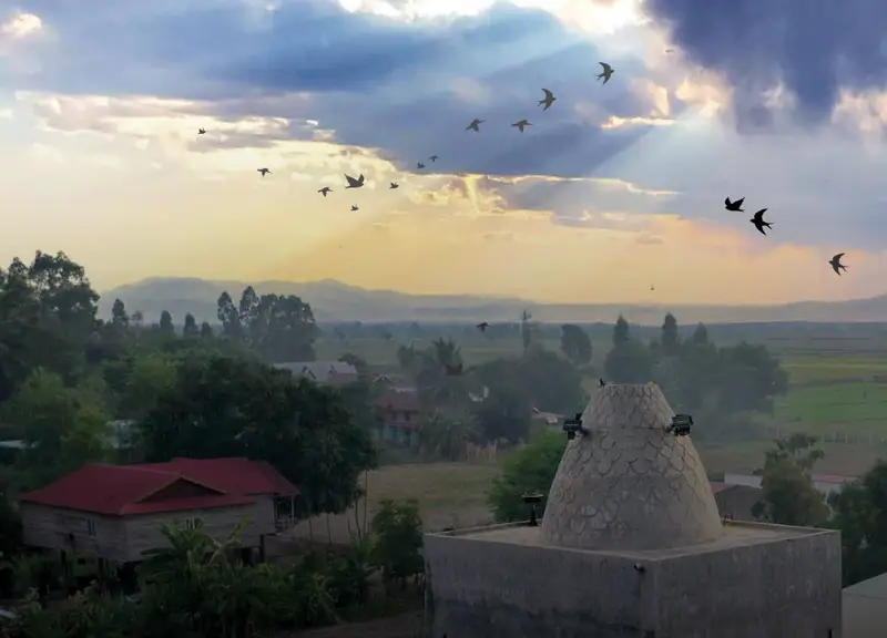 Swiftlet tower in the Gia Lai countryside at sunset