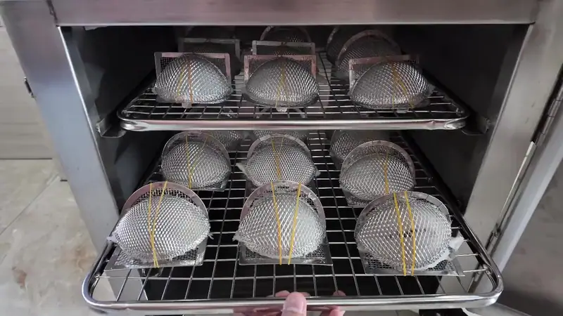 Moulded nests on racks in the cold dryer