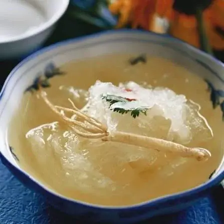 Savoury nest in clear broth